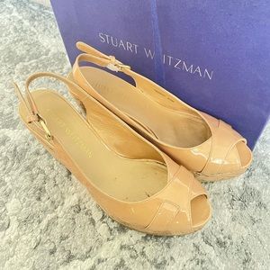 Stuart Weitzman nude Wedges
Patent Leather cork wedges 
Size: 6.5